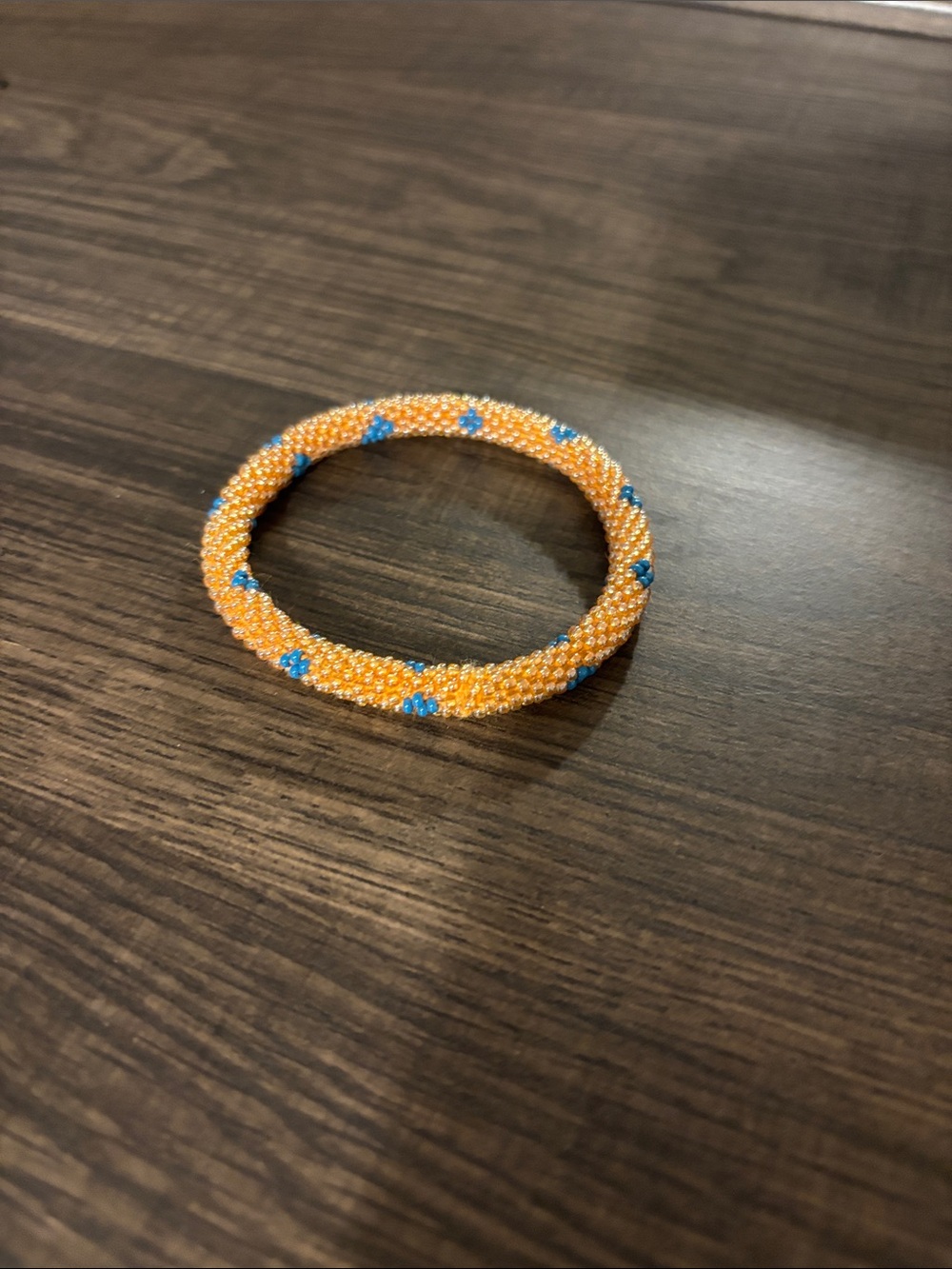 Orange Beaded Bracelet with Blue Accents